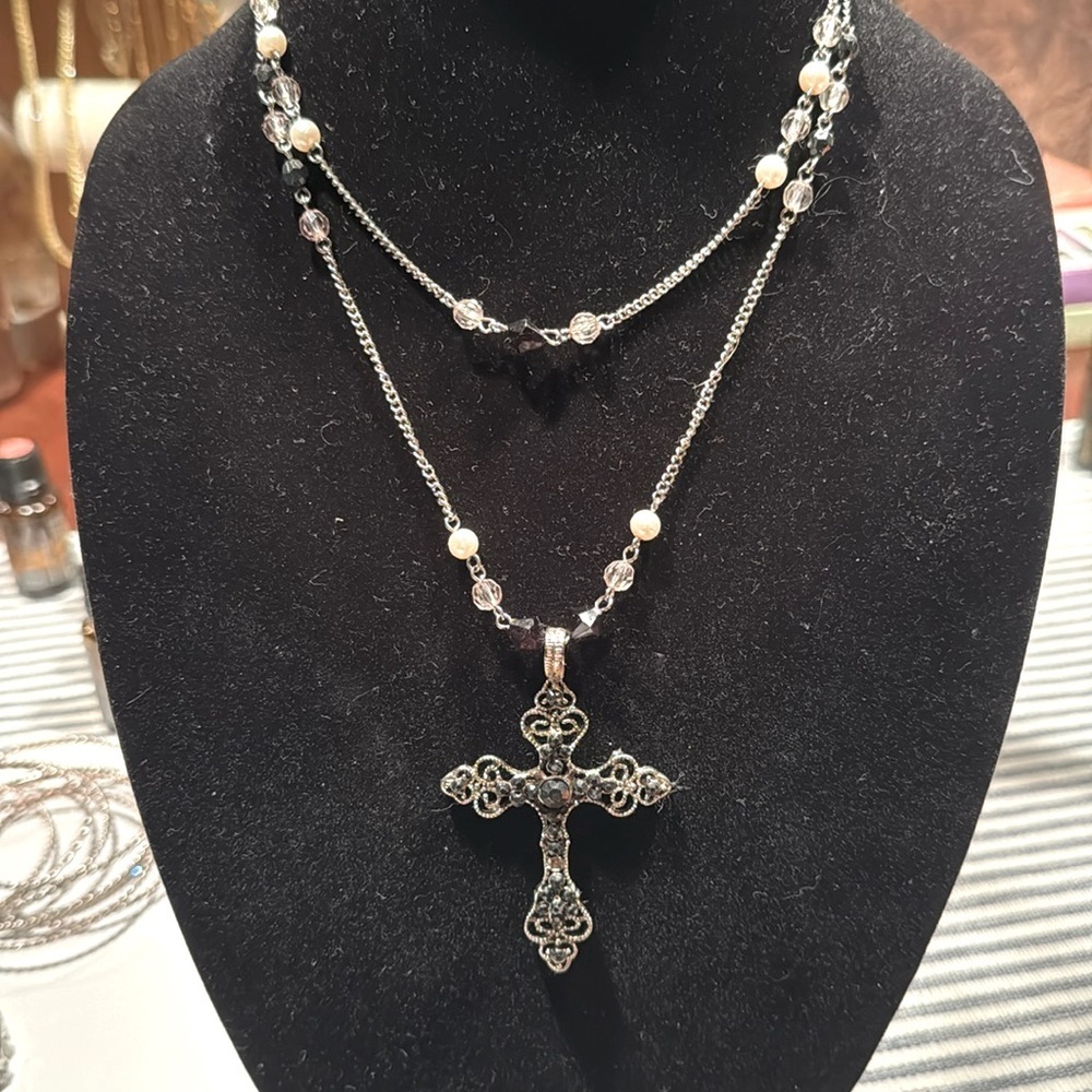 Beautiful silver cross necklace.